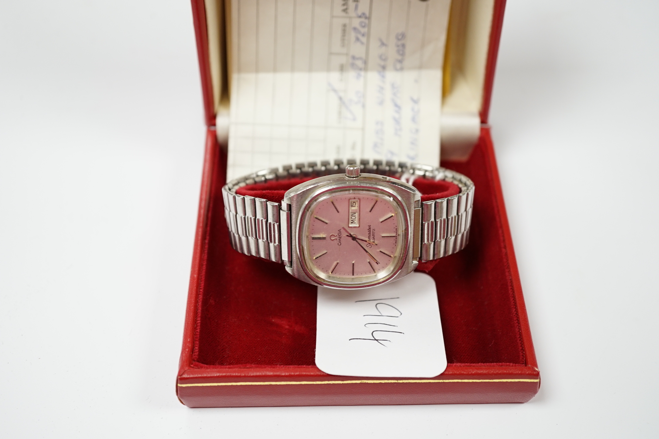 A gentleman's 1980's stainless steel Omega Seamaster quartz wrist watch, with day date aperture, on associated flexible strap, with box and papers.